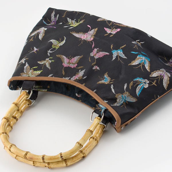 Sort taske m. sommerfugle mønster - klik og se flere detaljer på denne vare
